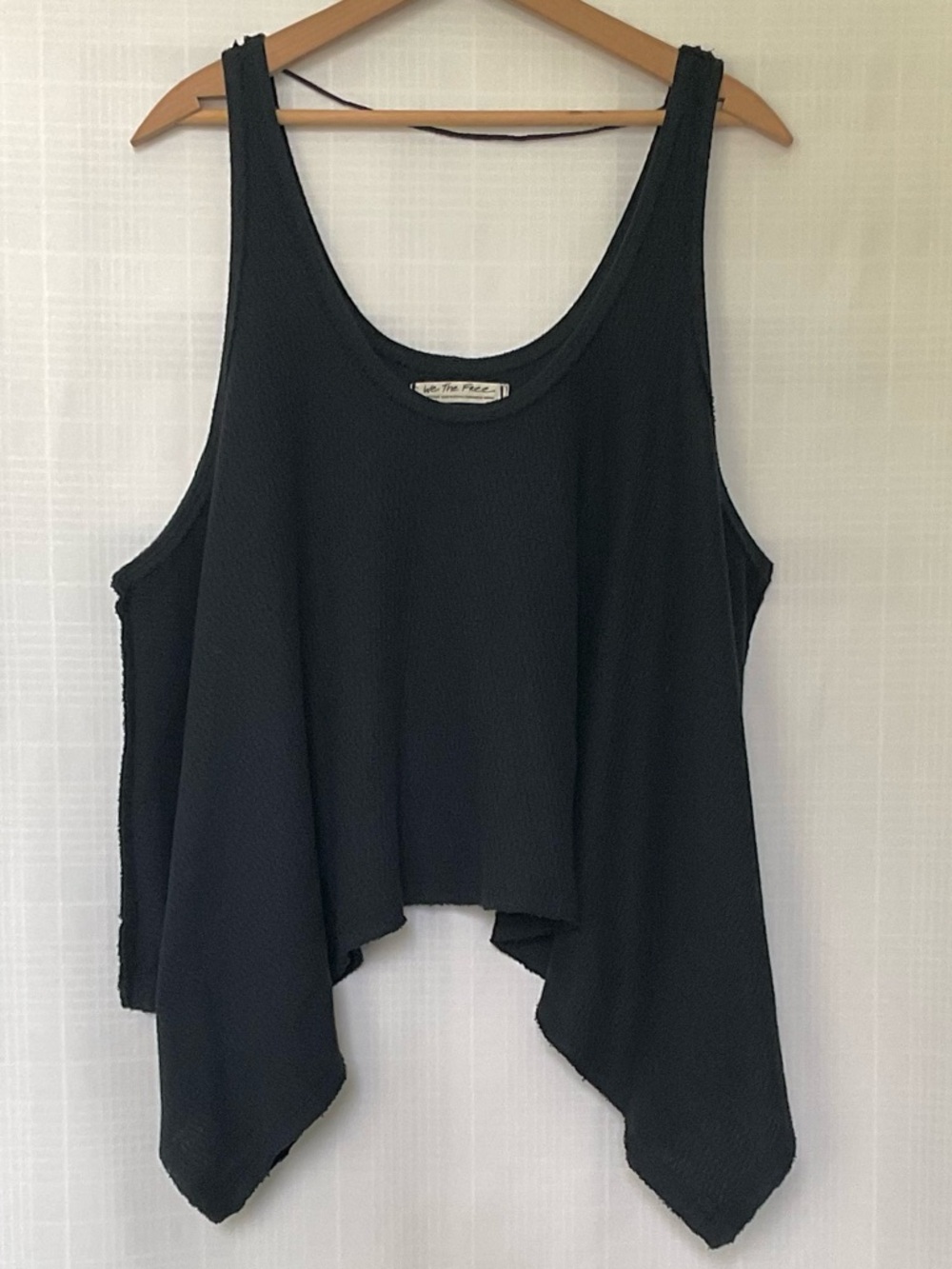 Free People textured Black Handkerchief Hem Tank with exposed seams